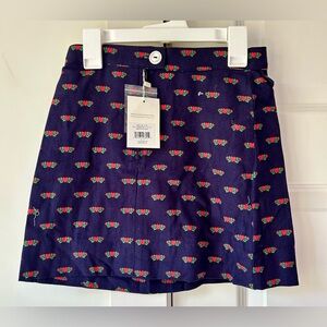 The Beaufort Bonnet Company Navy Skirt with Red Floral Design